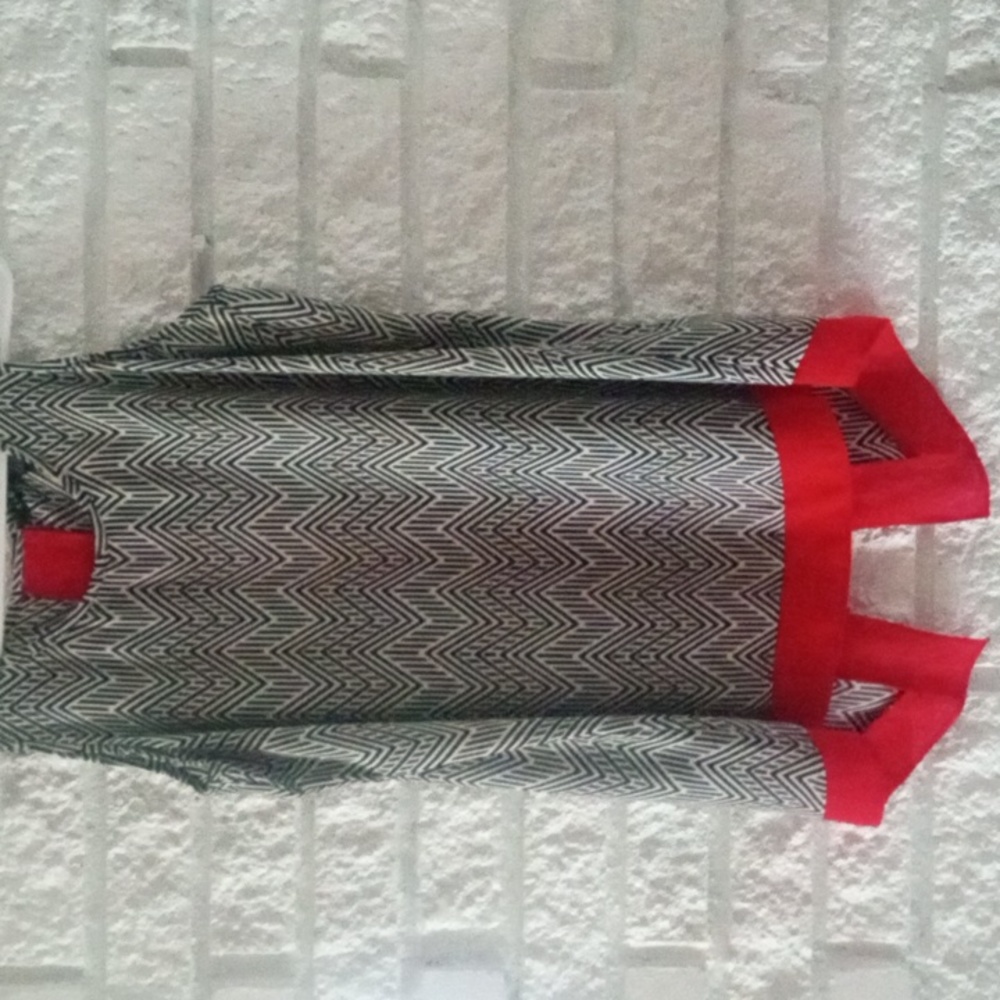 Zac&Rachel silk top, open back, w red&black and white Chevron pattern w red hem.